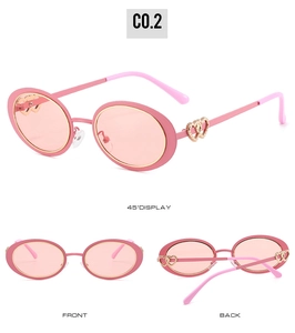 Pink oval frame sunglasses featuring golden heart decorations from multiple perspectives