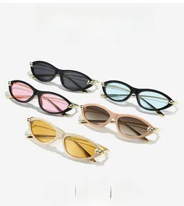 Detail view of cat eye sunglasses showing metallic chain temples and five color options