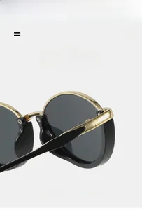 Detail of premium lightweight cat-eye sunglasses with metal hinges and flexible frame
