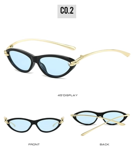 Three-angle display of cat-eye sunglasses with black frames and gold metal temples