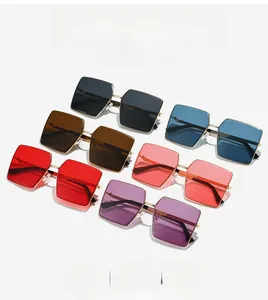 Close-up of rimless square sunglasses set with gold metal temples in six vibrant colors