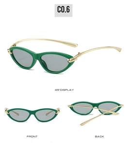Three perspectives of cat eye sunglasses with green frames and gold knot details