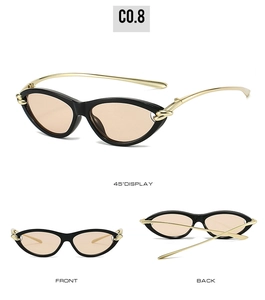 Three-view display of black cat-eye sunglasses with gold metal temples and tinted lenses