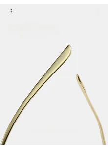 Detailed macro view of curved golden champagne metal temples for ergonomic comfortable wear