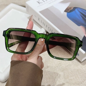 Classic emerald green square frame sunglasses with gradient brown lenses in retro style