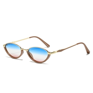 Modern metal cat-eye sunglasses with gradient lenses and stylish gold frames for women