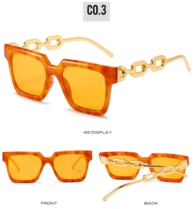Three-view display of orange tortoiseshell sunglasses with decorative gold chain temples
