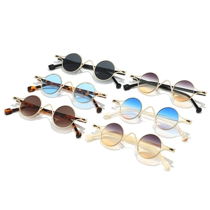 Modern oval small frame silver metal sunglasses with creative wavy bridge and colorful lenses
