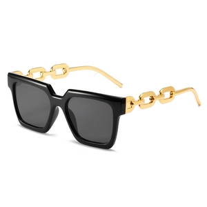 Fashionable oversized square sunglasses with gold metal chain temples and black frame