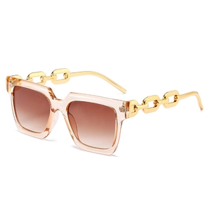 Champagne square sunglasses with chunky gold chain temples and brown gradient lenses