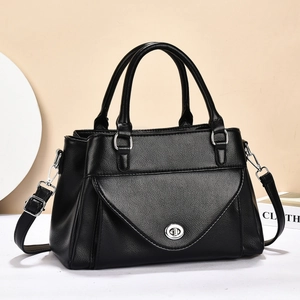 Elegante zwarte crossbodytas van leer met litchistructuur en zilveren details