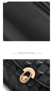 Detail einer schwarzen gesteppten Lederhandtasche mit elegantem goldenem Drehverschluss