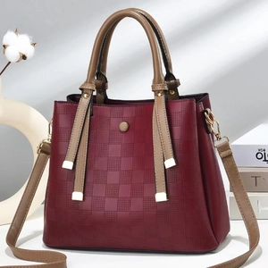 Burgundy checkered texture large tote bag with tassel accent and khaki leather handles