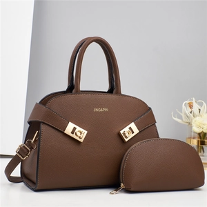 Deep brown lychee texture leather tote bag set with golden hardware and shoulder strap