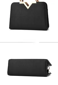 Detailed back and bottom view of black PU tote with V-shaped buckle and geometric pattern