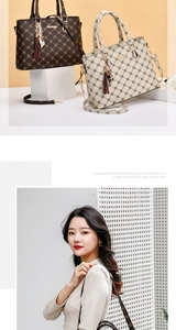 Macro view of geometric pattern tote bag with tassel charm and adjustable strap