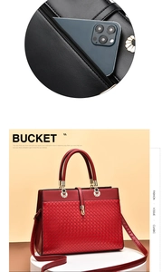 Detail of red embossed PU leather bag featuring a functional back zipper pocket for phone