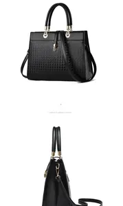Detail of black woven leather tote with gold hardware and removable shoulder strap