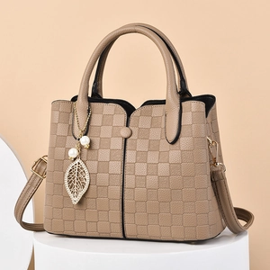 Large khaki leather handbag for women featuring checkered texture and pearl leaf charm