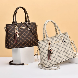 Large capacity printed handbag with geometric patterns and cat charm in brown and beige