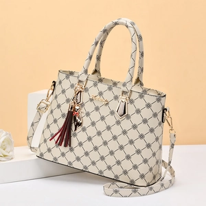 Danbaoly printed tote bag with crossbody strap, floral pattern and cat charm decoration
