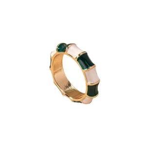 Bamboo style fashion ring with gold metal and green white enamel finish