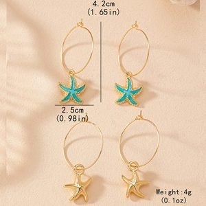 Boucles d'oreilles créoles étoile de mer dorées avec émail bleu pour style de plage d'été