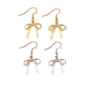 Boucles d'oreilles nœuds minimalistes en or et argent avec finition polie brillante