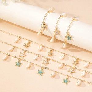Ensemble de colliers dorés avec étoile de mer et coquillages pour style de plage