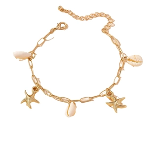 Ocean-themed gold starfish and seashell charm bracelet for beach holiday jewelry