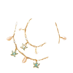 Ensemble de trois bracelets de cheville dorés style océan avec étoile de mer et coquillage