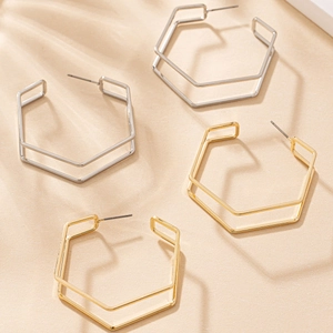 Double-layered geometric hexagon hoop earrings in polished gold and silver finishes