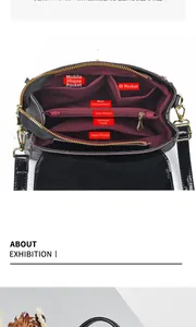 Internal view showing burgundy lining and multiple functional storage pockets of the black bag