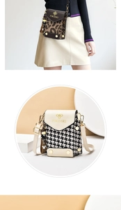 Detail of trendy leopard and houndstooth mini crossbody bags with small bear charms