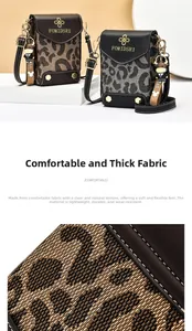 Close-up of leopard print mini crossbody bag showing woven texture and precise stitching