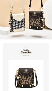 Detail view of leopard and houndstooth phone bags with stylish cartoon charm and logo