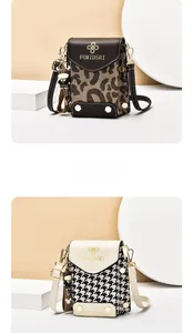 Detail view of mini leopard print crossbody bag with metal studs and cute bear pendant