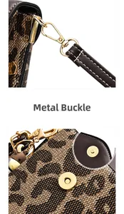 Close-up of golden hardware swivel hook and magnetic buckle on leopard print bag