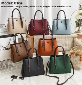Detail showing seven colors of textured lychee grain leather bags with 28x13x23cm dimensions