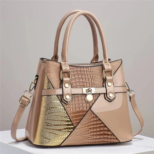 Lizard embossed leather handbag with shiny panels and gold metal hardware