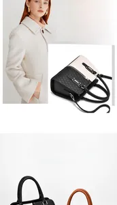 Close-up of contrast color structured handbag with diamond quilting and metal lock