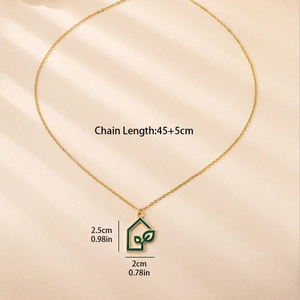 Gold-plated house pendant necklace with green leaf detail and size specifications