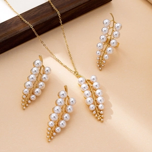 Golden leaf and pearl jewelry set with branch necklace and earrings for summer vacation