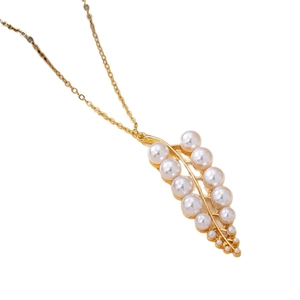 Elegant gold leaf pendant necklace with lustrous white pearls on a fine O-chain