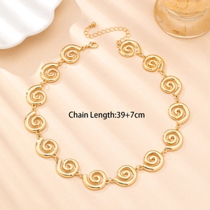 Golden geometric chain necklace with spiral links and adjustable clasp, 39+7cm length