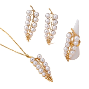 Elegant gold leaf and pearl jewelry set including necklace, earrings, and open ring