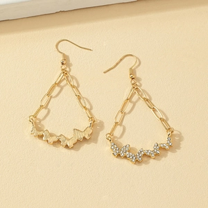 Gold butterfly tassel earrings with crystal rhinestones and long drop chain fringe