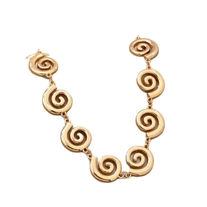 Chic gold spiral link necklace with minimalist vintage aesthetic for women