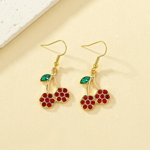 Elegant gold cherry earrings featuring red rhinestones and green crystal leaf accents