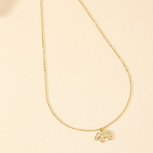 Gold plated elephant pendant necklace with sparkling crystals on a minimalist chain